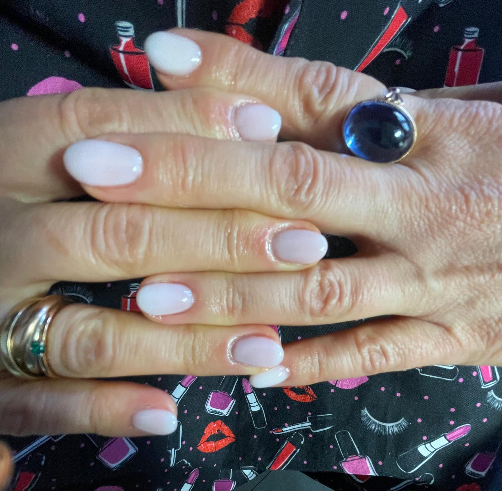 Classic manicure with milky pink nails — La Herradura